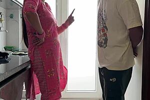 jawan bhatija puts condom on big ass chachi then fucks her hard in kitchen