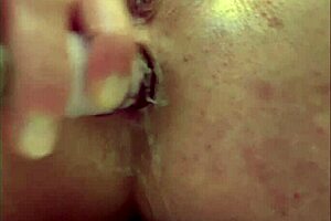 She masturbates anally while moving grapes inside