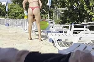 i was jerking off by the pool when this big tit milf helped me explode cumshot