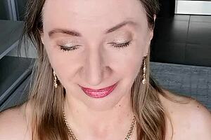 Mature Beauty's Seductive Striptease Bedroom Training