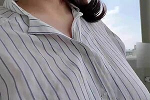 chubby japanese wife masturbates lewdly in apartment hallway