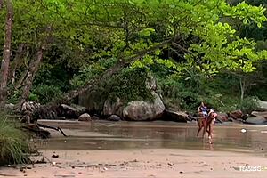 brunette milf sucks big cock on beach before anal pounding