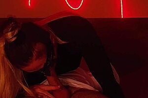 blonde milf sucks cock then rides it hard under red lights