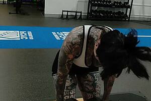 Gym milf's juicy booty shakes during intense workout session drawing all eyes