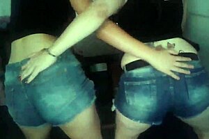 Meli dances playfully with her mom in lively rhythmic moves full of energy and joy together.