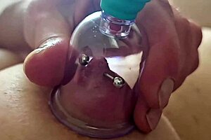 pumping my pierced nipples hard outdoors pov