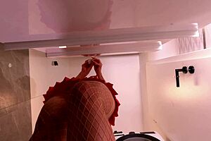 hottest redhead milf wife teases in shortest skirt fishnets in bathroom, wanna see?