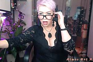 Redhead Milf Aimee Delivers Creampie in Fishnets