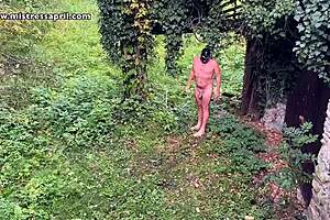 mistress april dominates with enema bondage chaining workout in outdoor garden nature