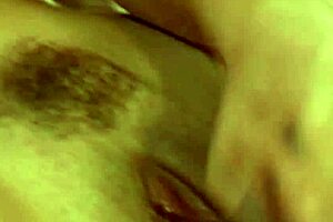 Fucking Herself With A Black Dildo